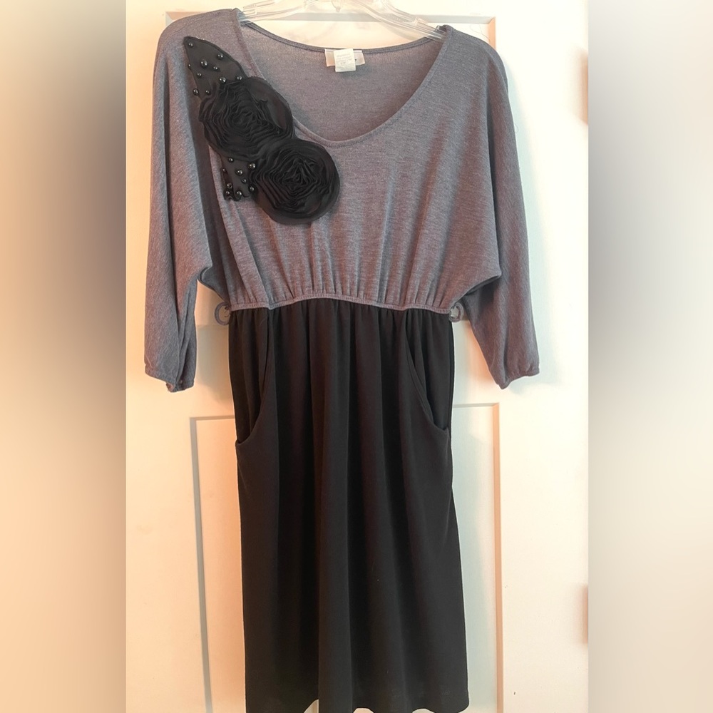 Black and gray dress with Tull and beading detail, pockets and belt eyelets.